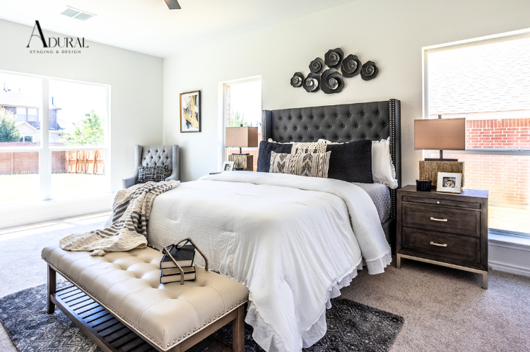 Beautifully staged primary bedroom.